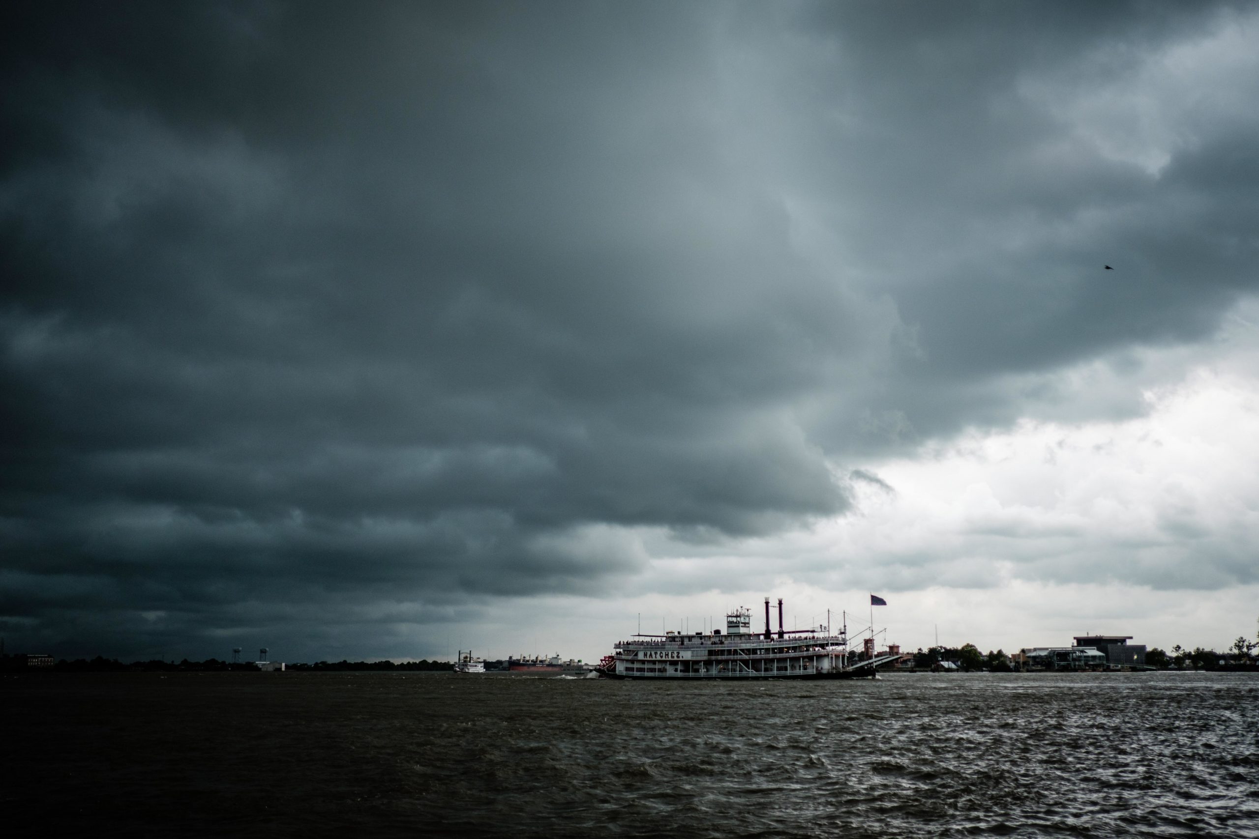 storm clouds outside New Orleans shoreline