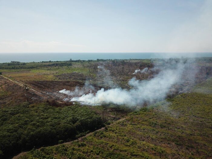 Aerial image of illegal burning of cleared peatlands inside the Rawa Singkil Wildlife Reserve for the establishment of Mr Mahmudin’s palm oil plantation. 