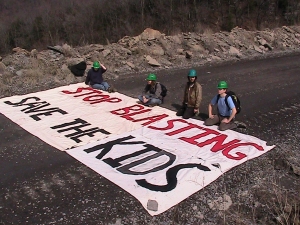 kneeling-with-banner-nicole-motson1