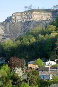A mountaintop removal mine above a community in Appalachia