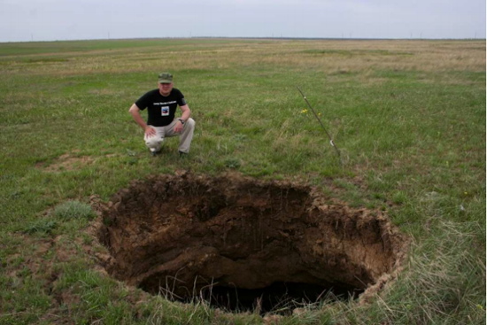 Sink hole in steppe, 2 km from the south side of Berezovka, April 2012.